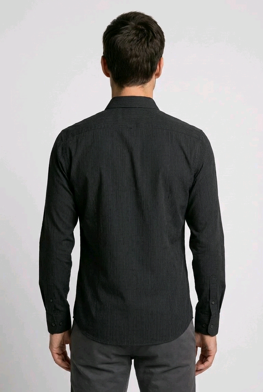 Man wearing a black shirt from behind 