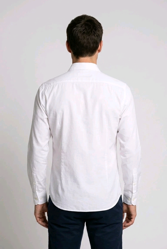 Man wearing a white formal shirt and dark trousers