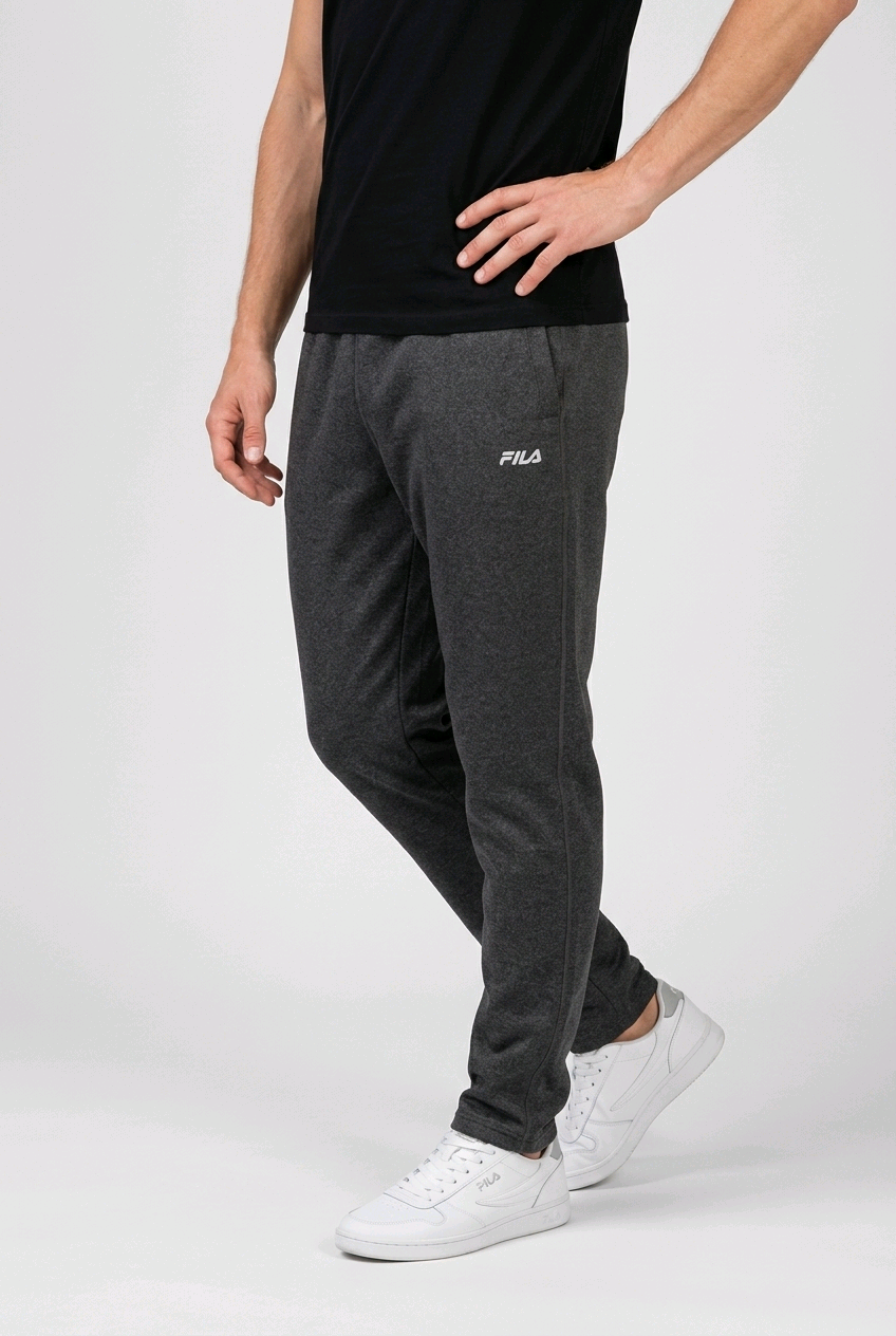 Man wearing grey FILA joggers