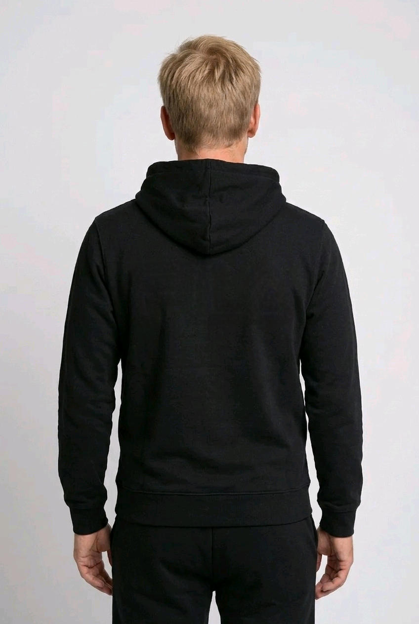 Man wearing a black hoodie from behind 