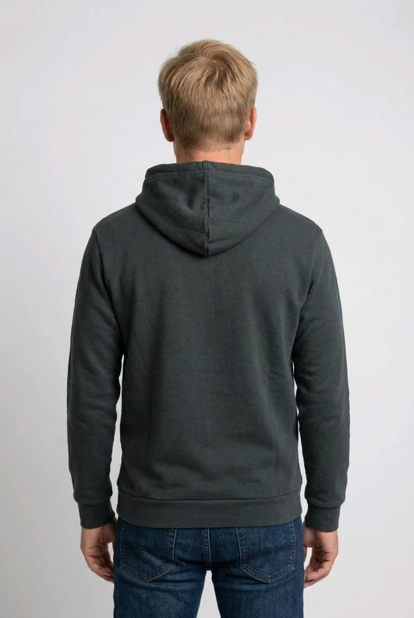 Man wearing a dark green hoodie back view, preloved condition