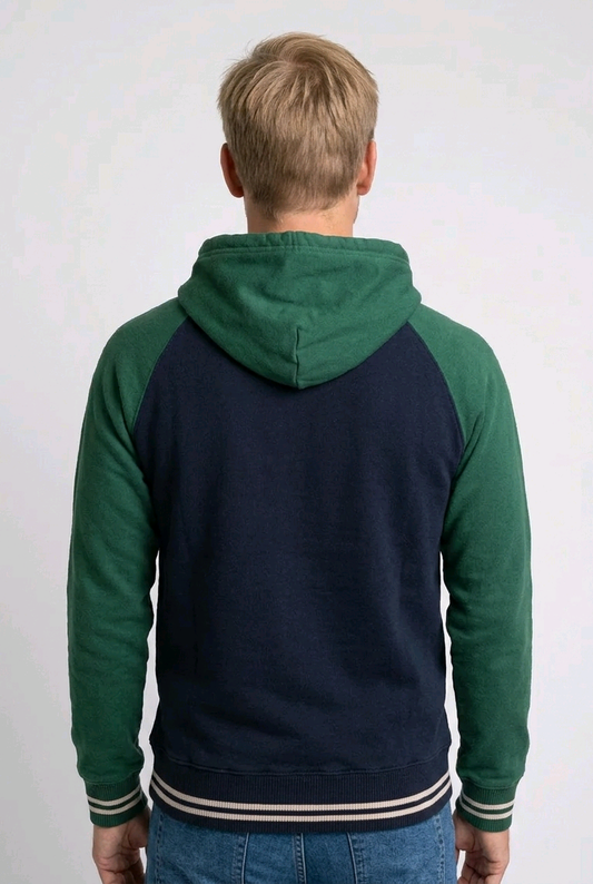 Man wearing a green and navy hoodie back view