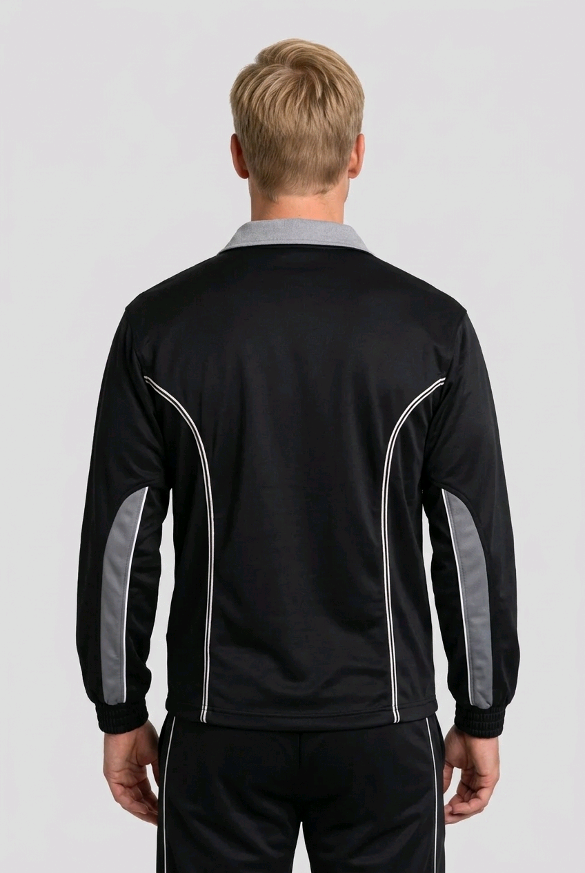 Man weraing a black sports jacket back view