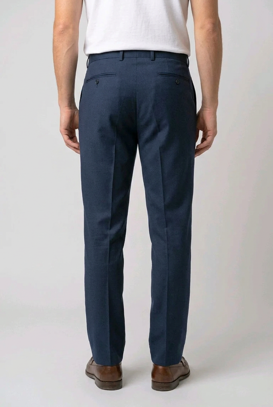 Man wearing navy blue trousers back view