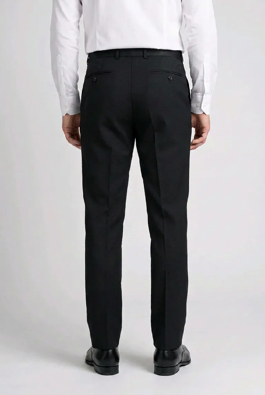 Man wearing black trousers with a white shirt 
