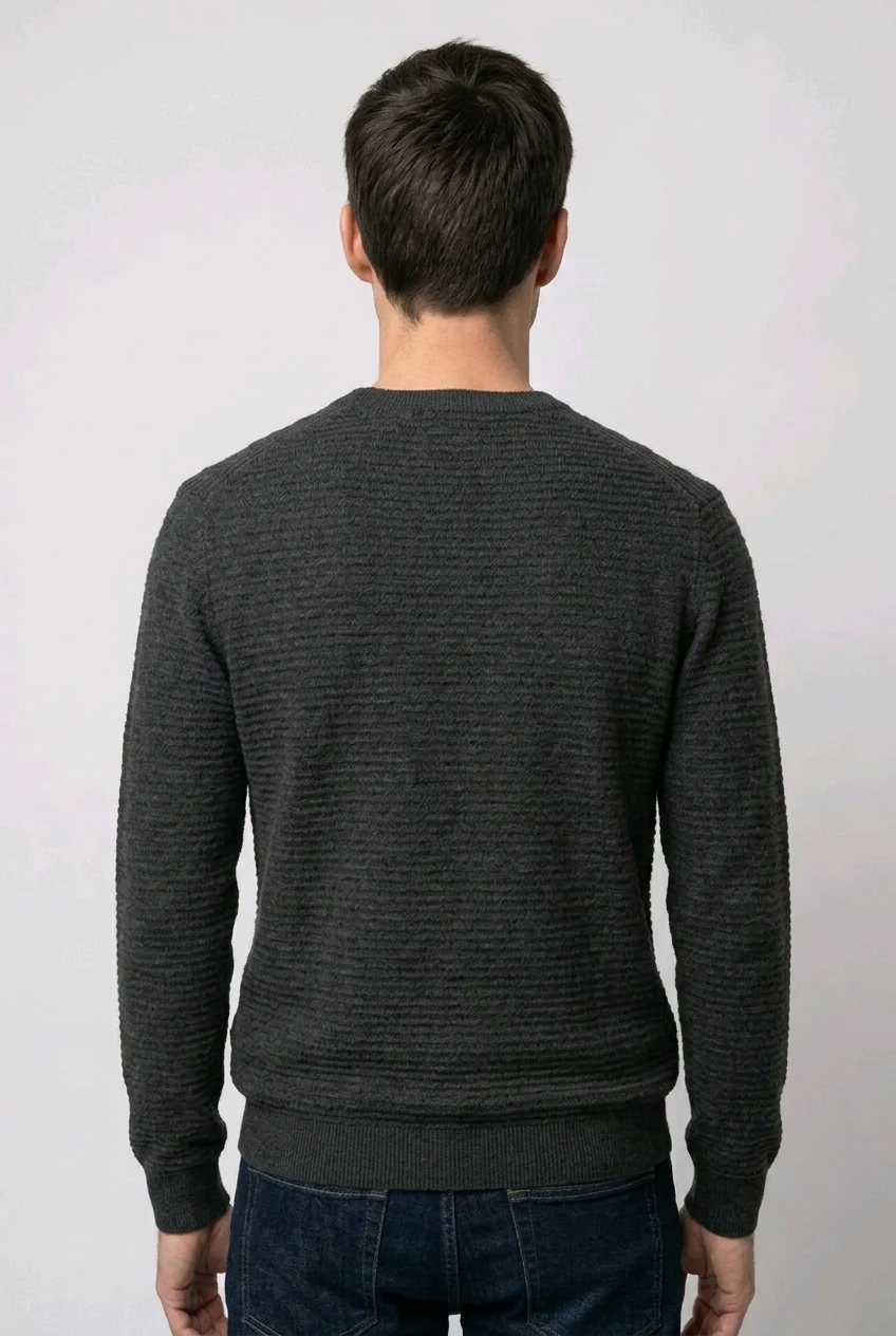 Man wearing a black textured jumper