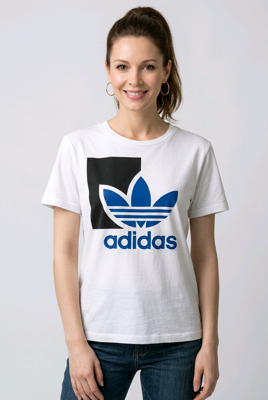 Woman wearing a white Adidas t-shirt with a black and blue logo