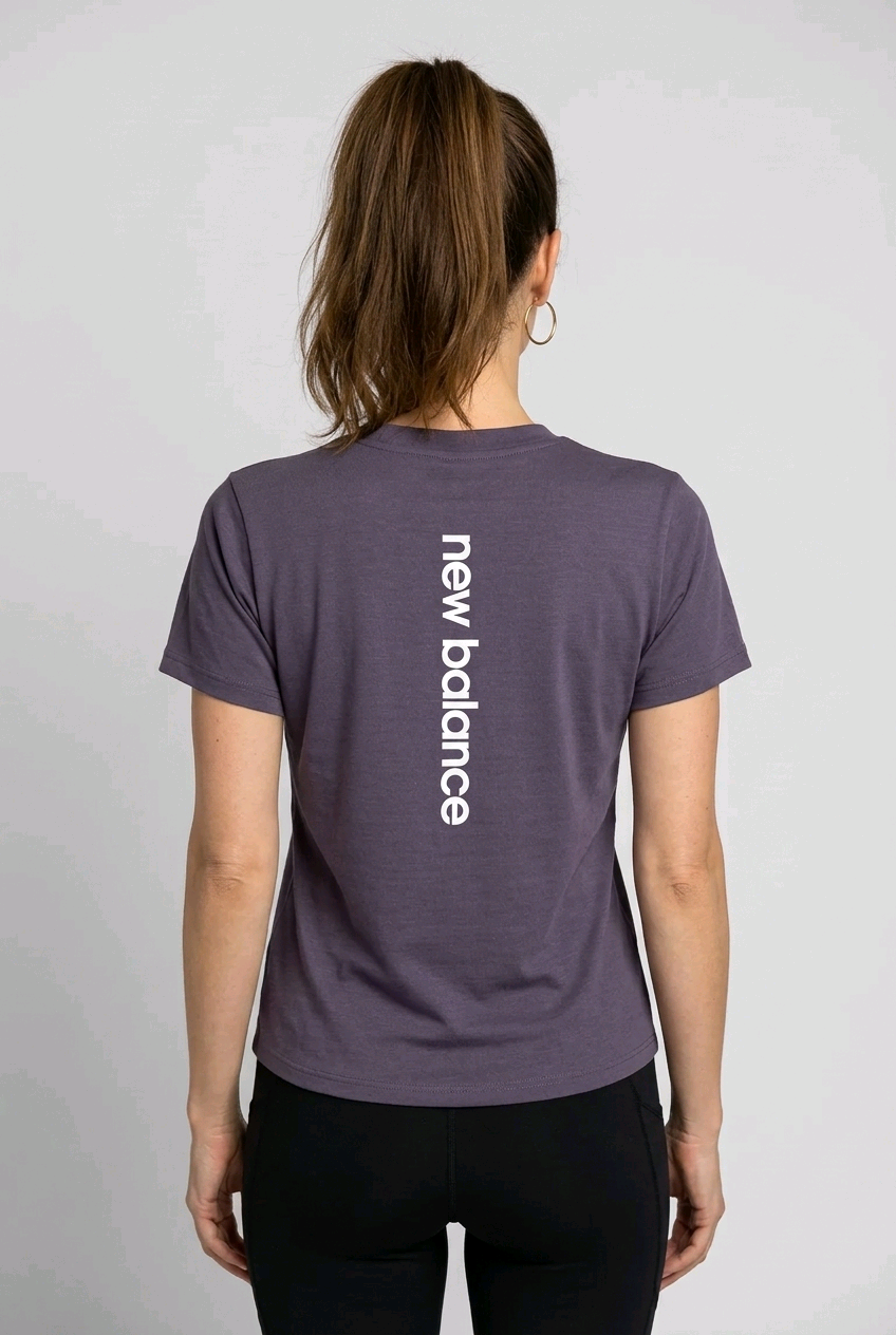 Woman wearing a purple New Balance t-shirt back view
