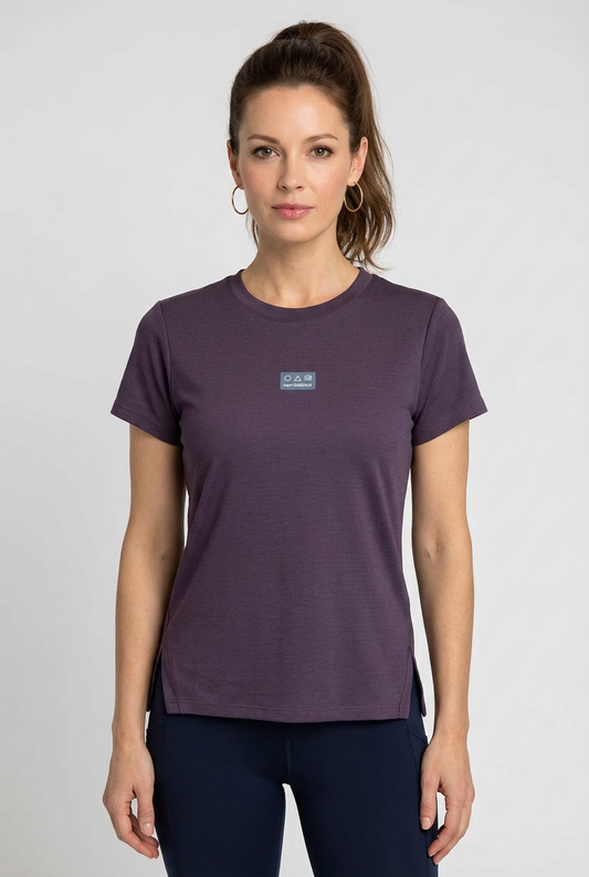 Woman wearing a purple NB t-shirt 