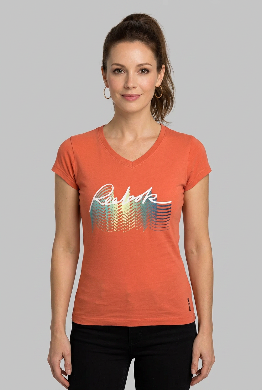 Woman wearing an orange Reebok t-shirt