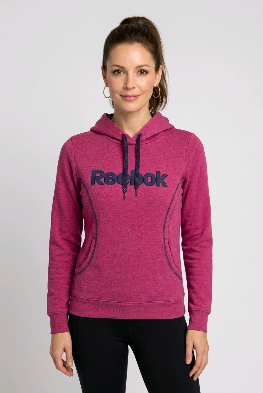 Woman wearing a pink Reebok hoodie 