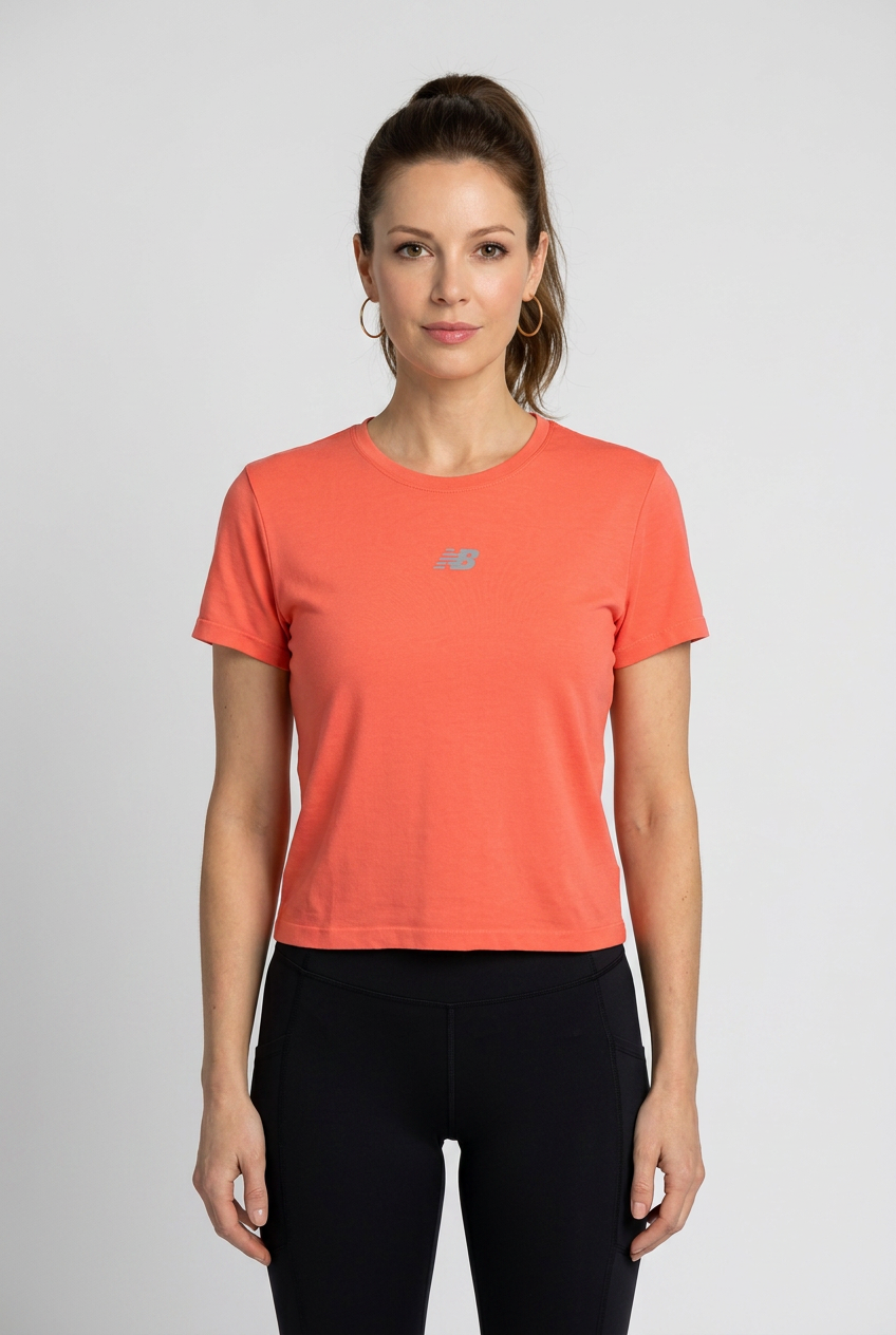 Woman wearing a coral NB t-shirt 