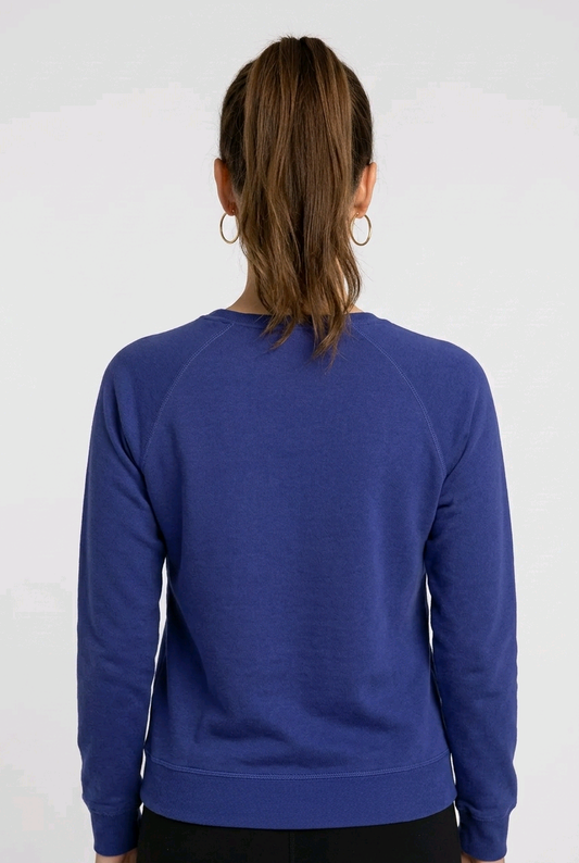 Woman wearing a blue nike sweatshirt back view