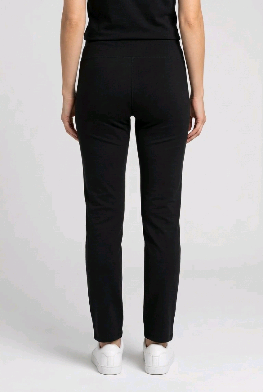 Woman wearing black Leggings back view