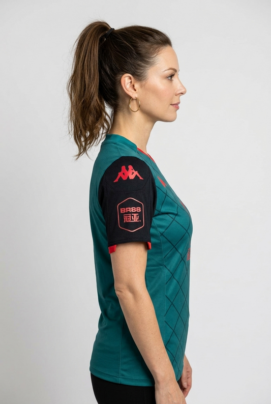 Woman wearing a Aston Villa Shirt side view