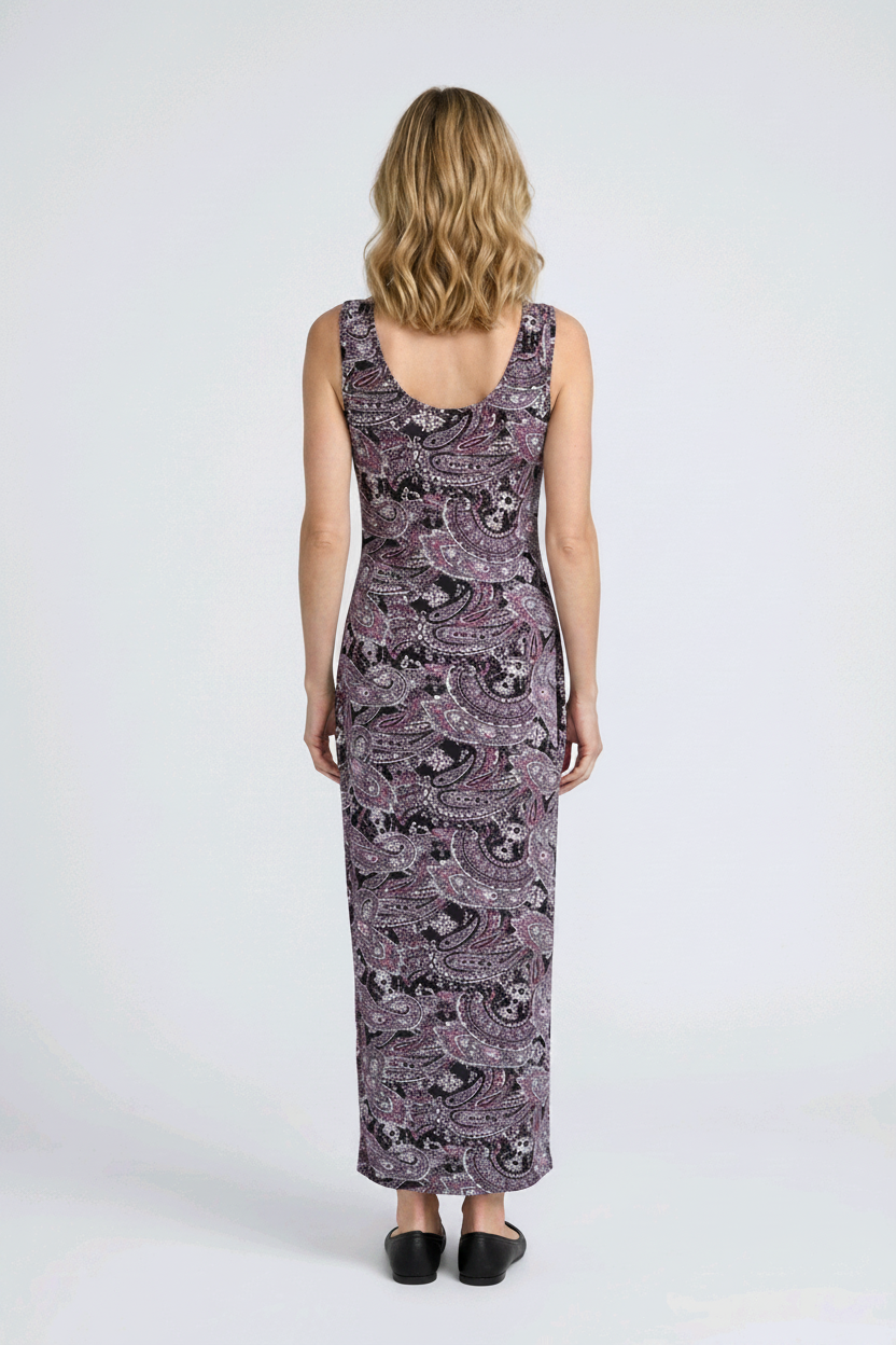 Woman wearing a sleeveless dress with a pattern 