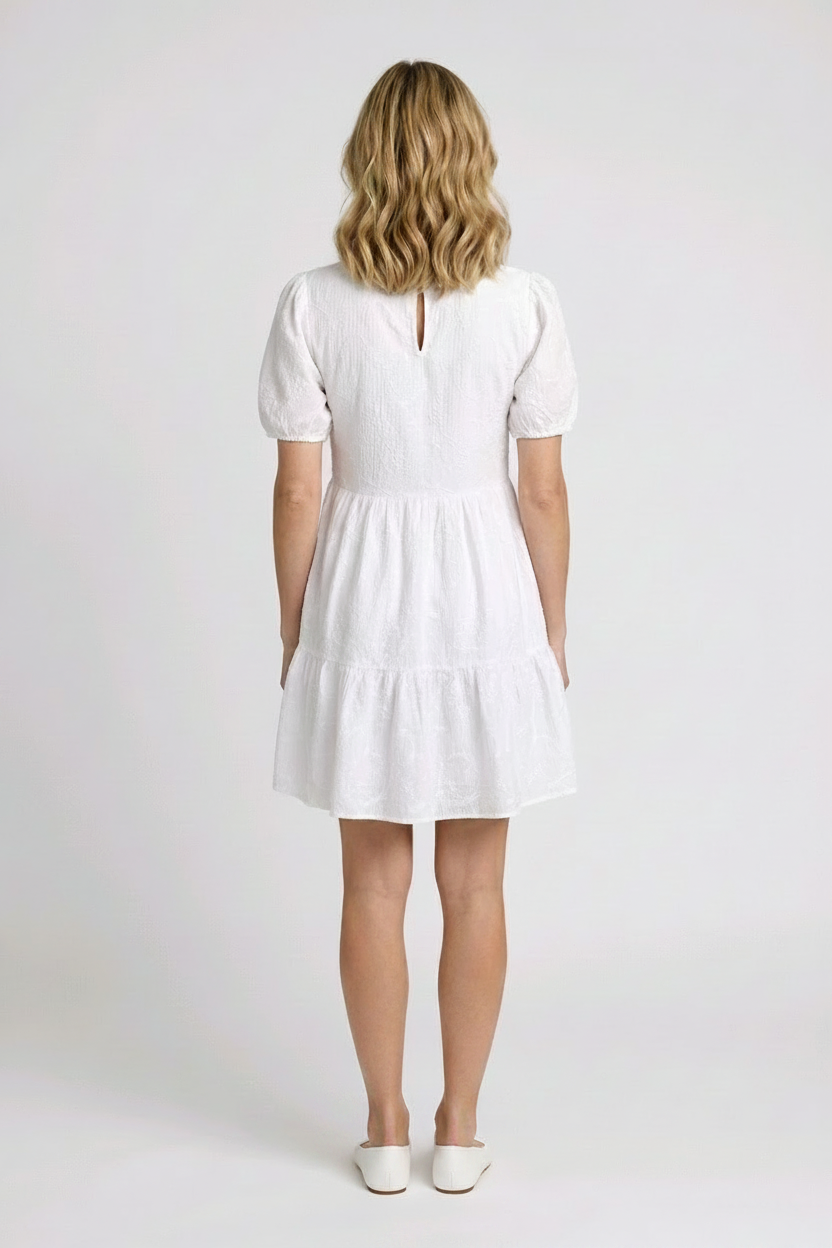 Woman wearing a white dress 