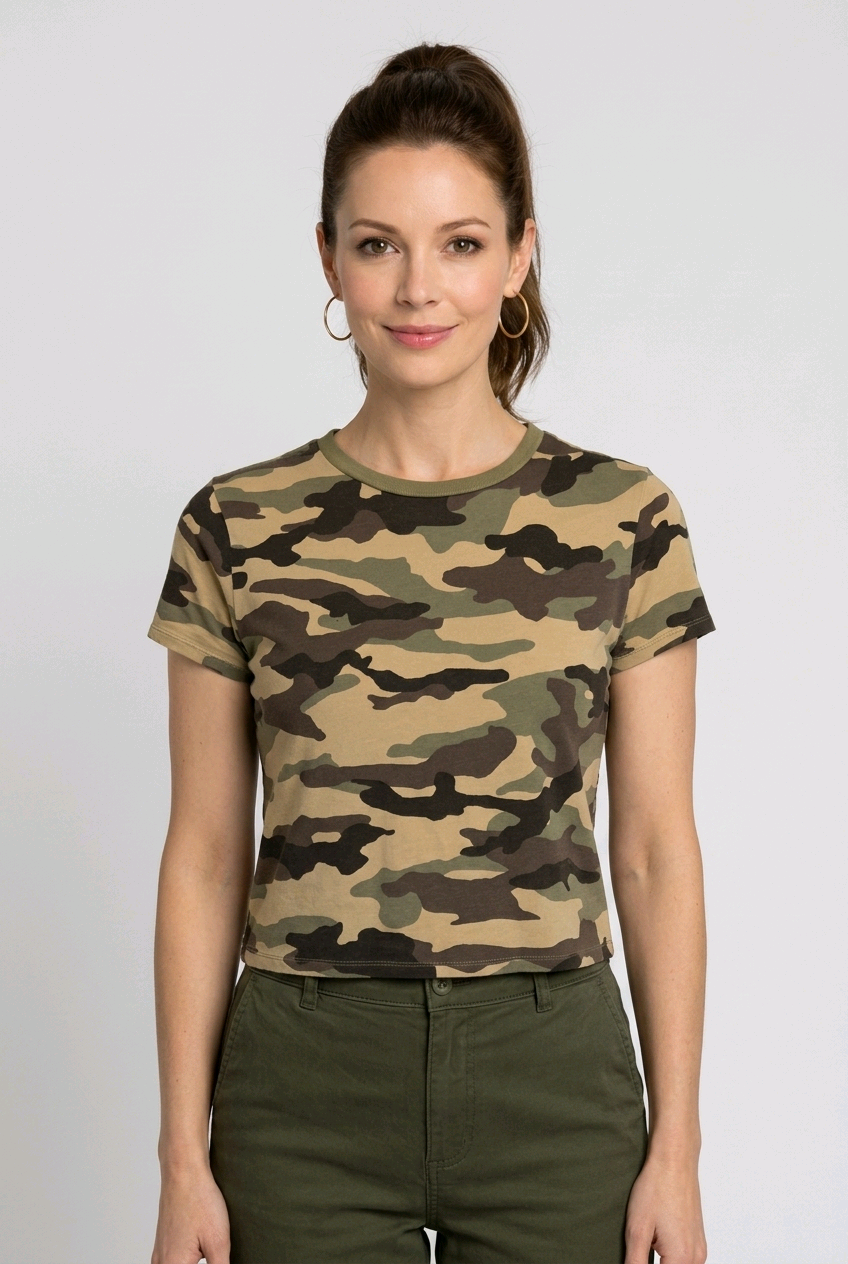 Woman wearing a camouflage t-shirt and green pants 