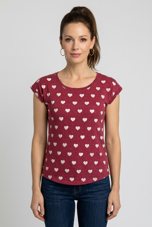 Woman wearing a red t-shirt with white heart pattern