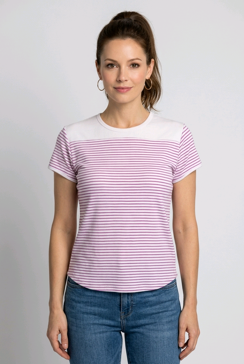 Woman wearing a white t-shirt with pink stripes and blue jeans