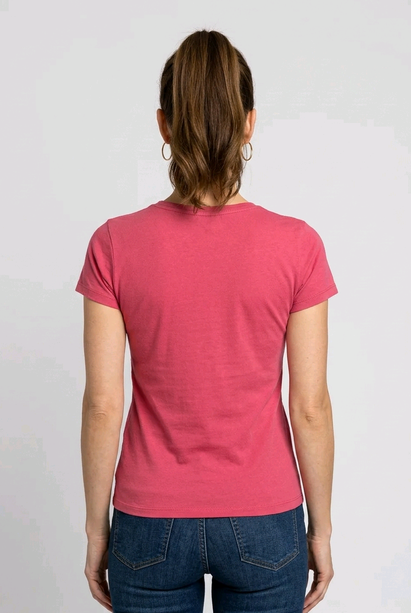 Person wearing a pink t-shirt and jean back view
