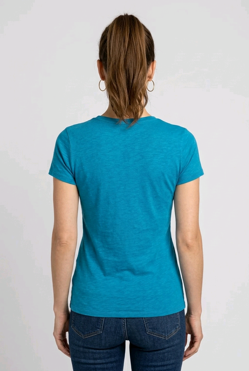 Person wearing a blue t-shirt back view