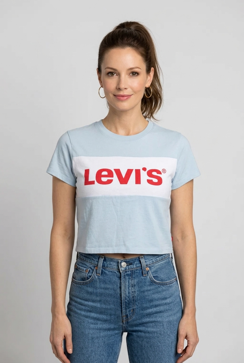 Woman wearing a light blue color-blocked t-shirt