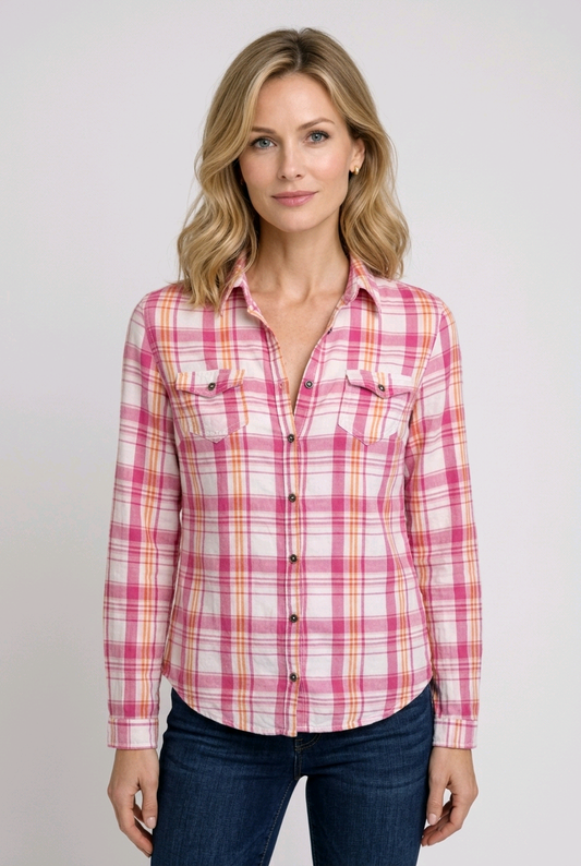 Woman wearing a pink and white plaid shirt 