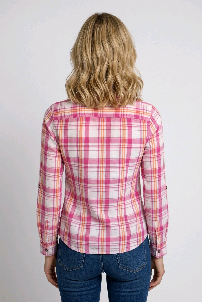Woman wearing a pink and white plaid shirt 