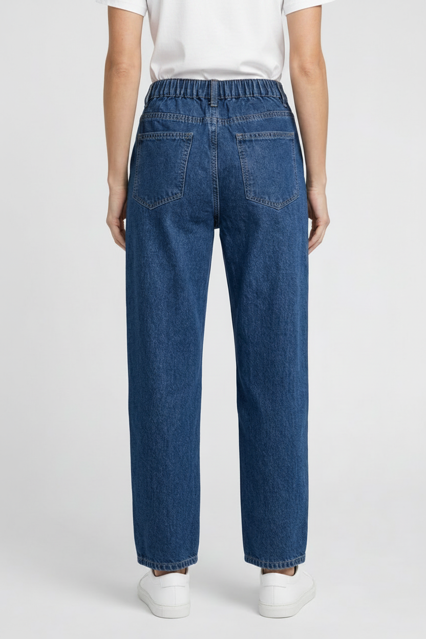 Woman wearing blue jeans and a white t shirt back view
