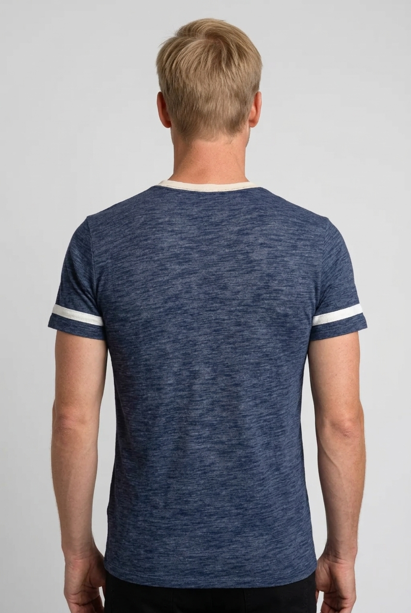 Man wearing a blue t-shirt with white stripes on sleeves 