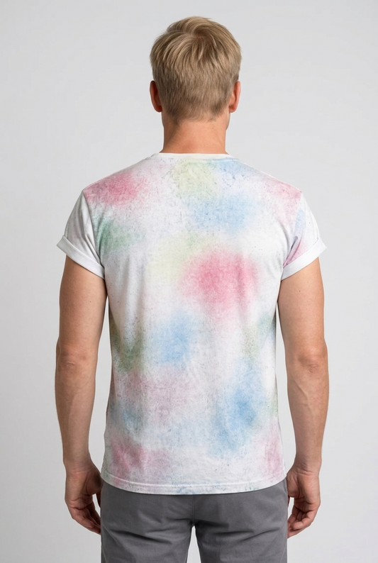 Person wearing a white t-shirt with colorful abstract design 