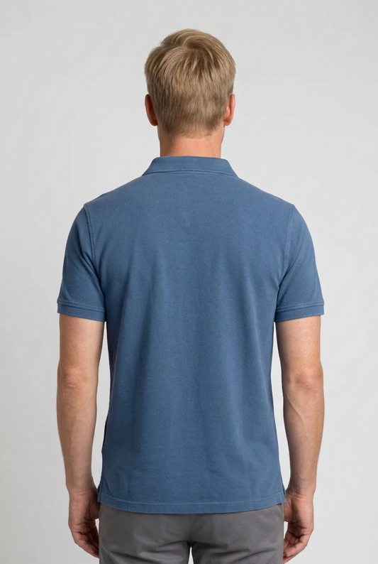 Man wearing a blue polo shirt 