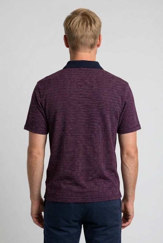 Man wearing a maroon striped polo shirt 
