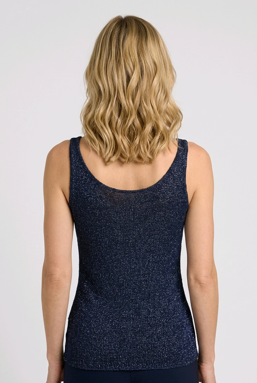 Woman wearing a navy blue tank top 