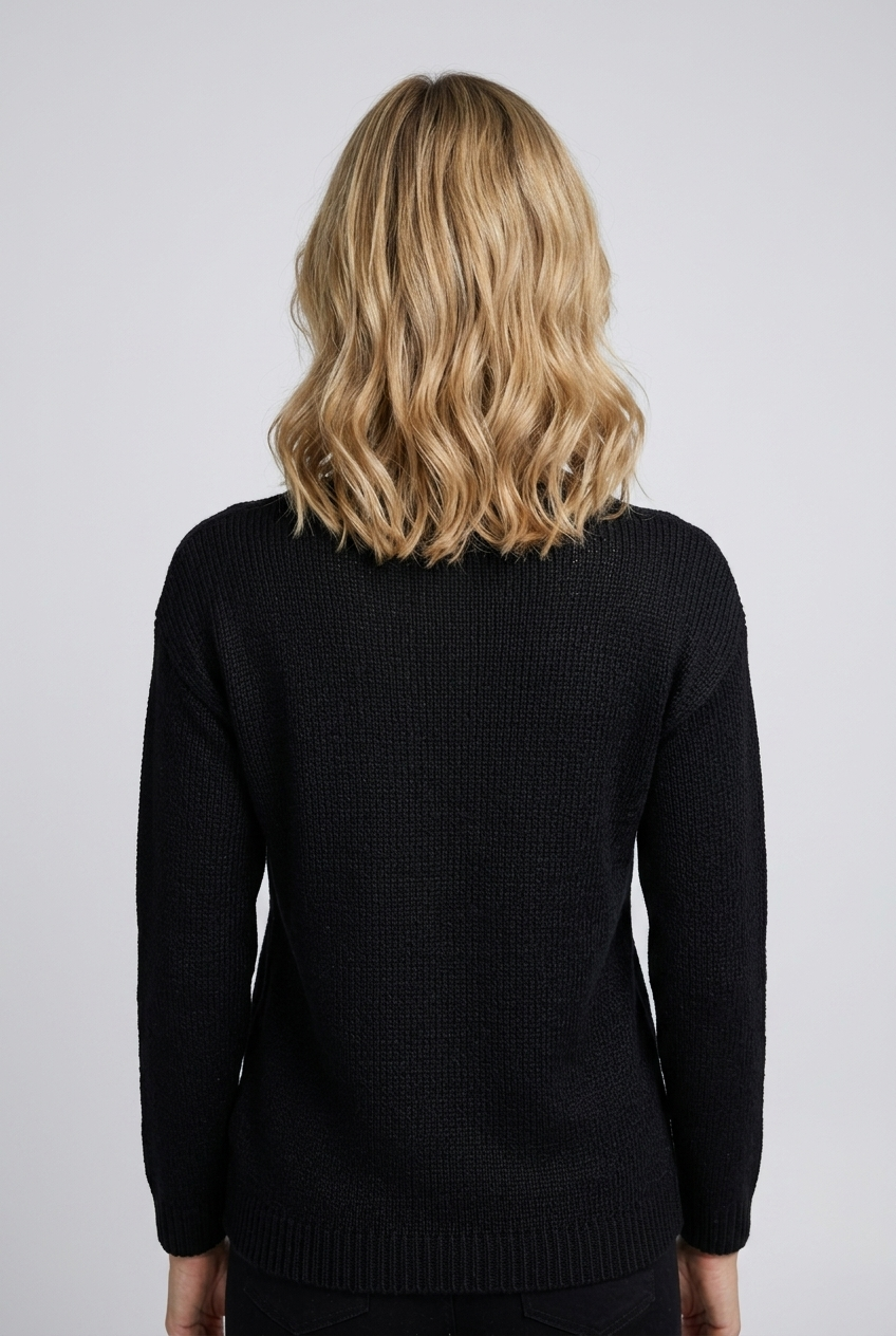 Woman wearing a black sweater back view