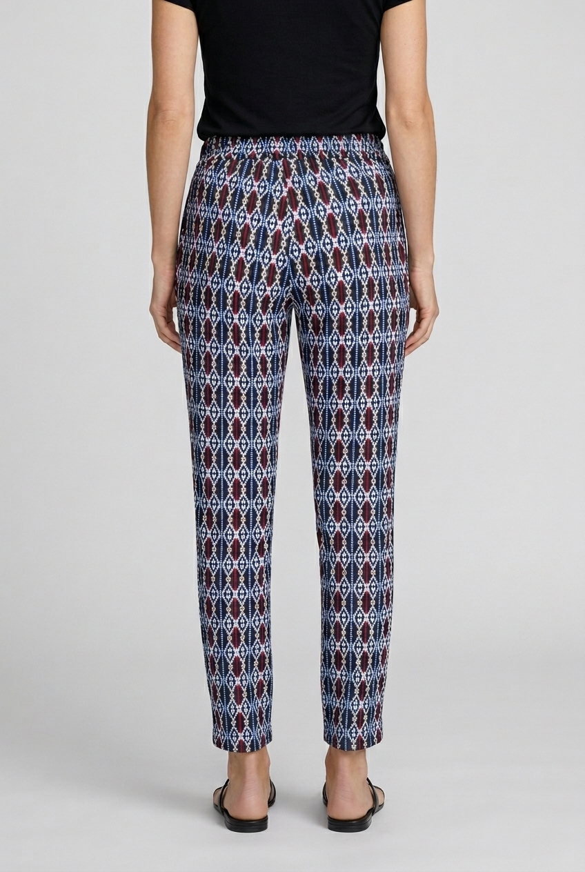 Person wearing patterned trousers back view