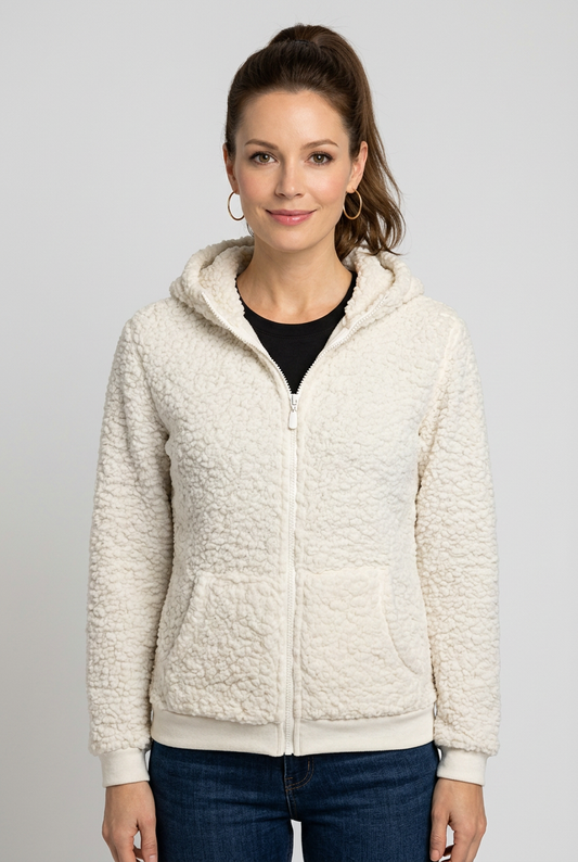 Woman wearing a cream-coloured fleece hoodie on a grey background