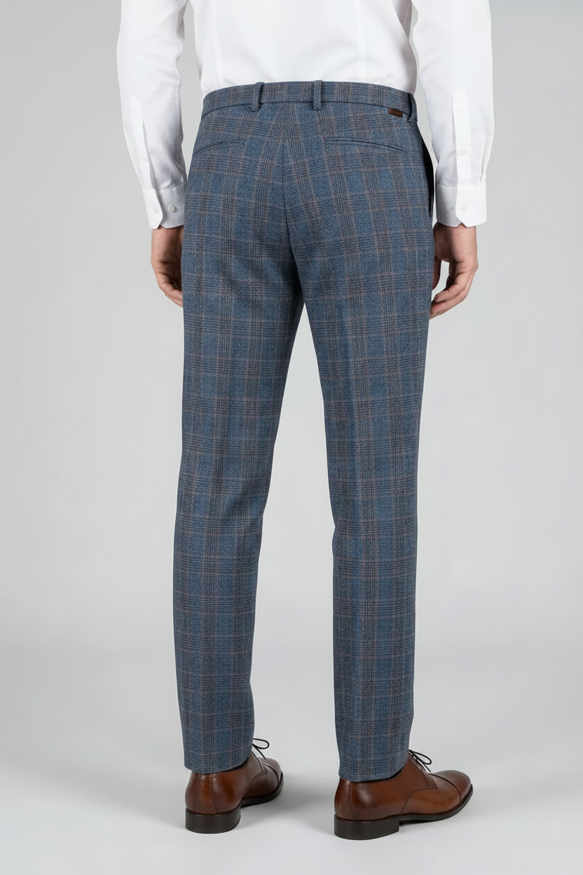 A man wearing blue-grey plaid trousers 