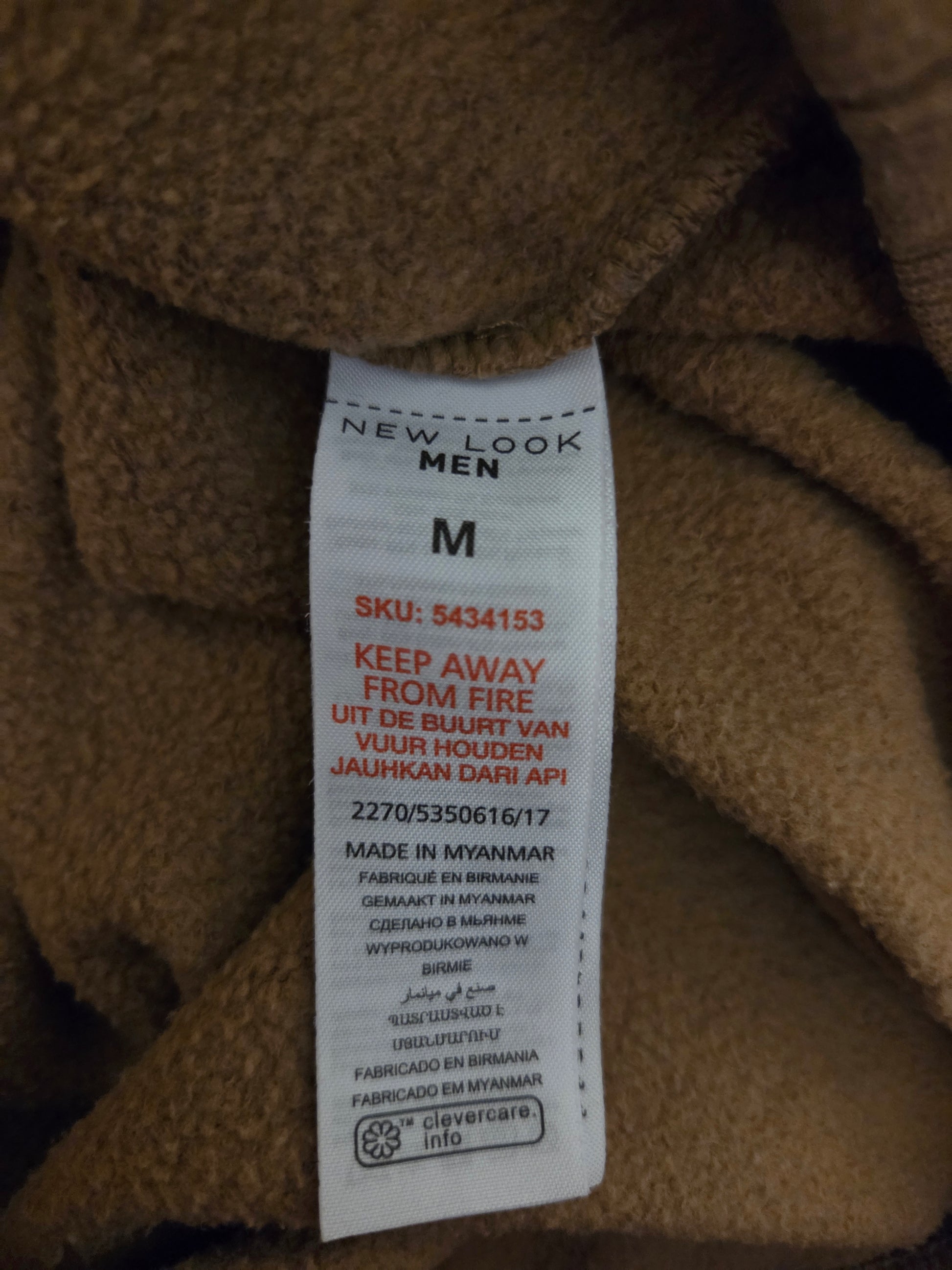 Brown fleece hoodie label