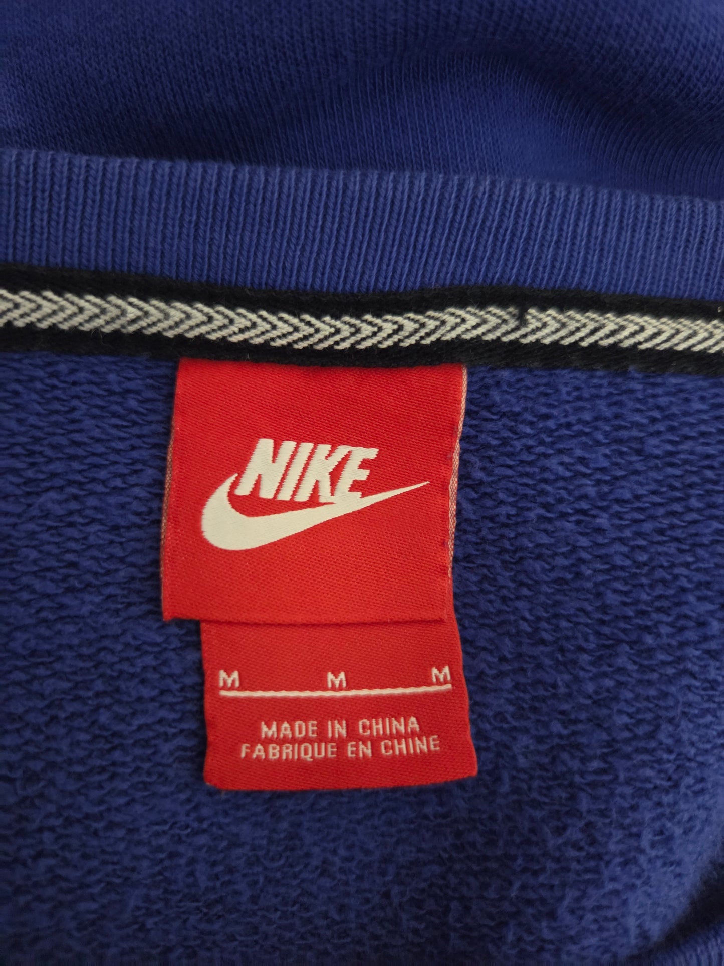 Red Nike size tag 