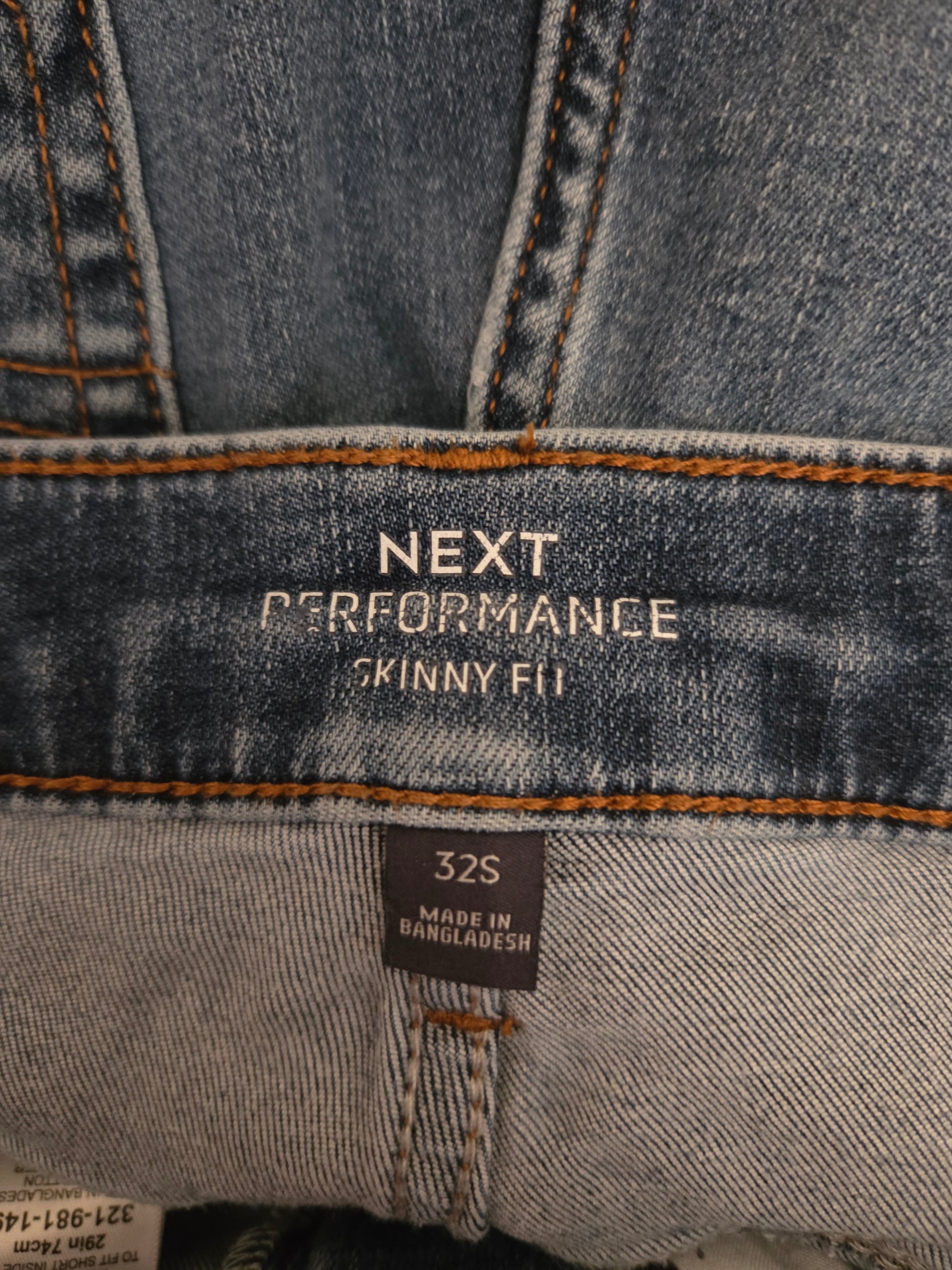 Size labels on a pair of jeans