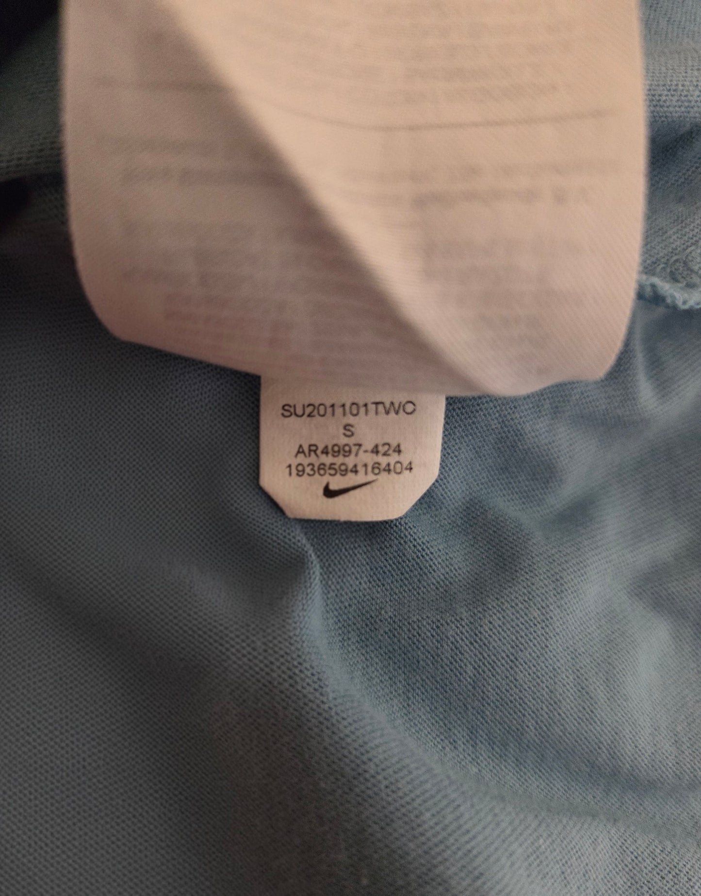Close-up of a Nike size tag 