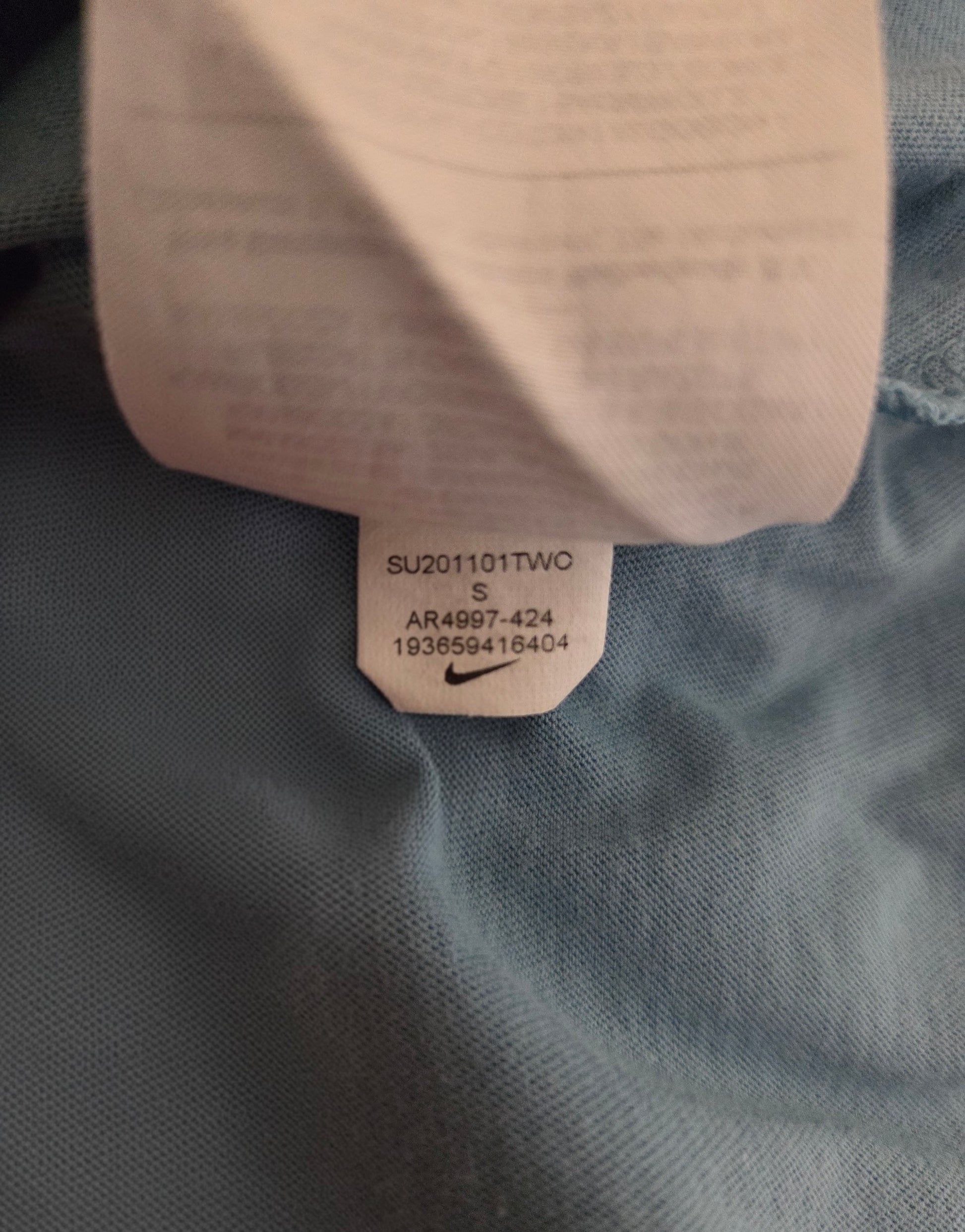 Close-up of a Nike size tag 
