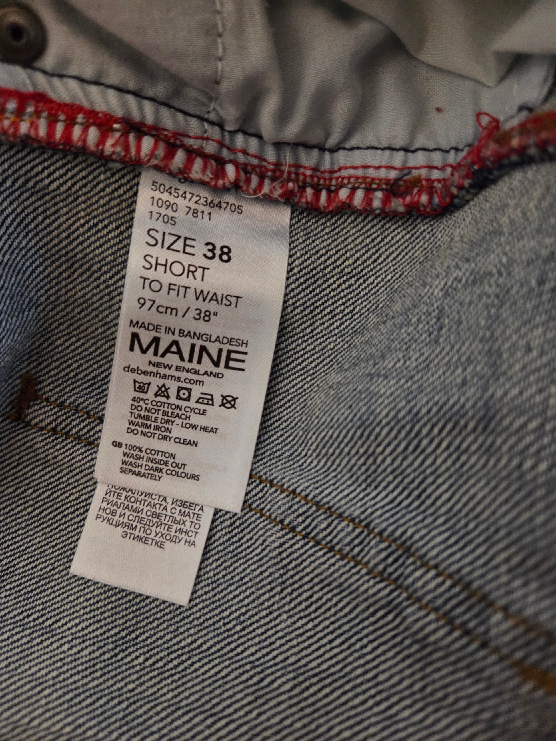 Size label for a pair of blue jeans