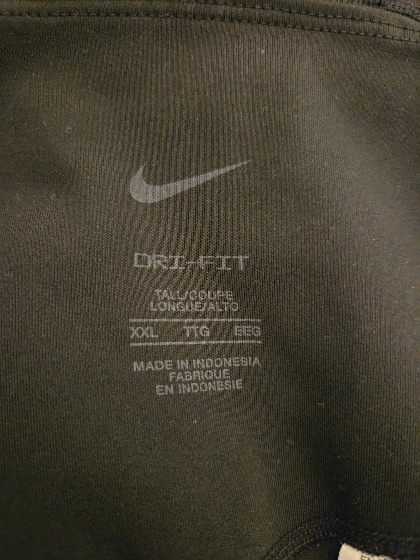 Nike logo and 'Dri-FIT' size label