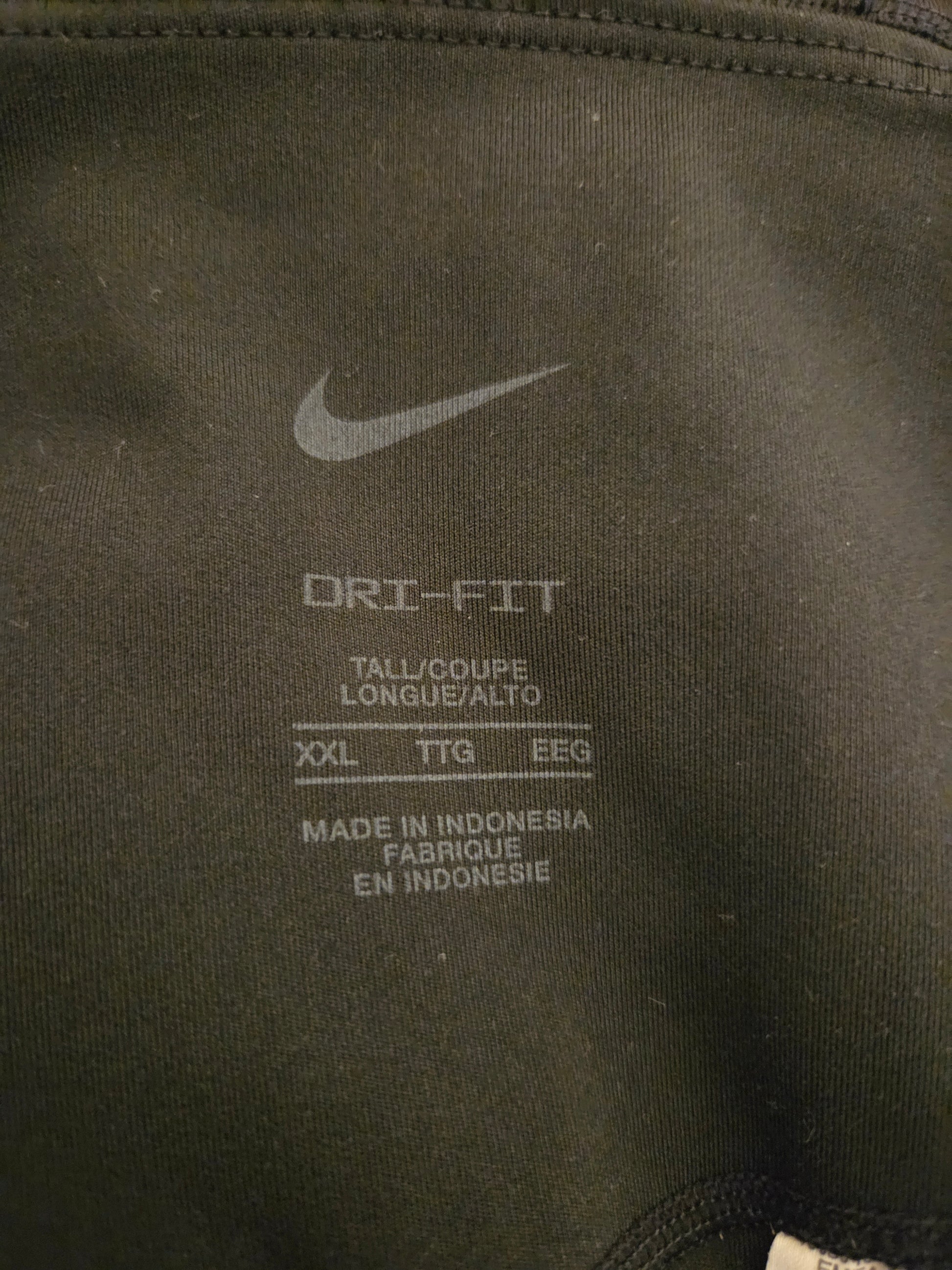 Nike logo and 'Dri-FIT' size label