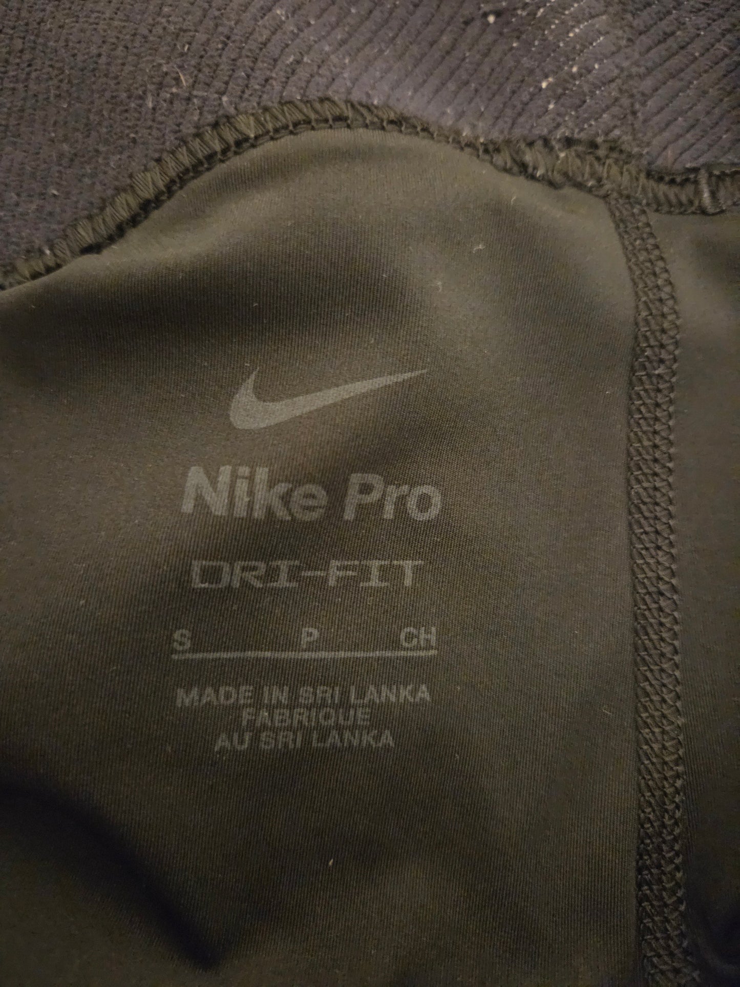 Close-up of Nike Pro Dri-FIT size label 
