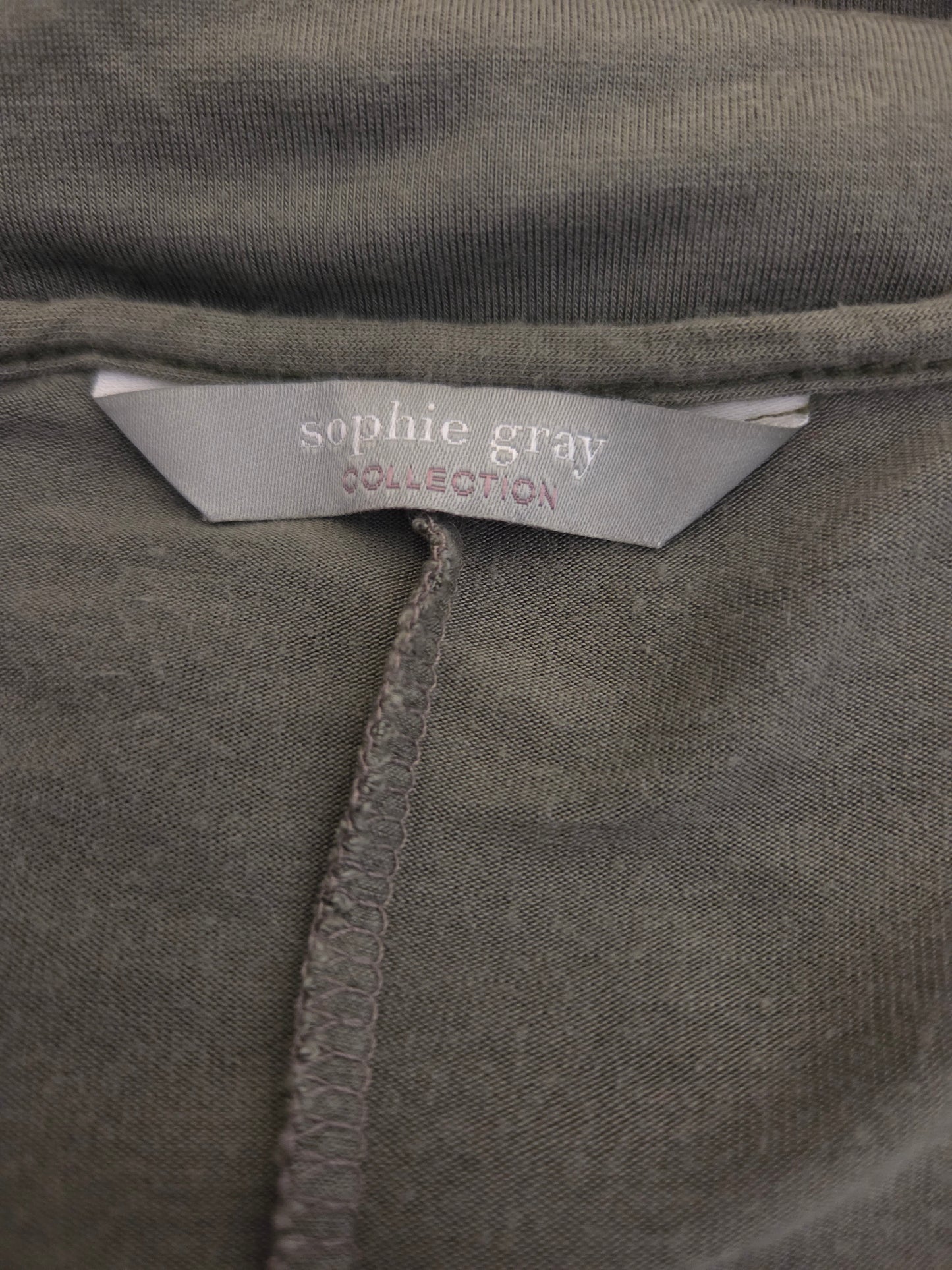 Olive green fabric with a 'sophie gray collection' label
