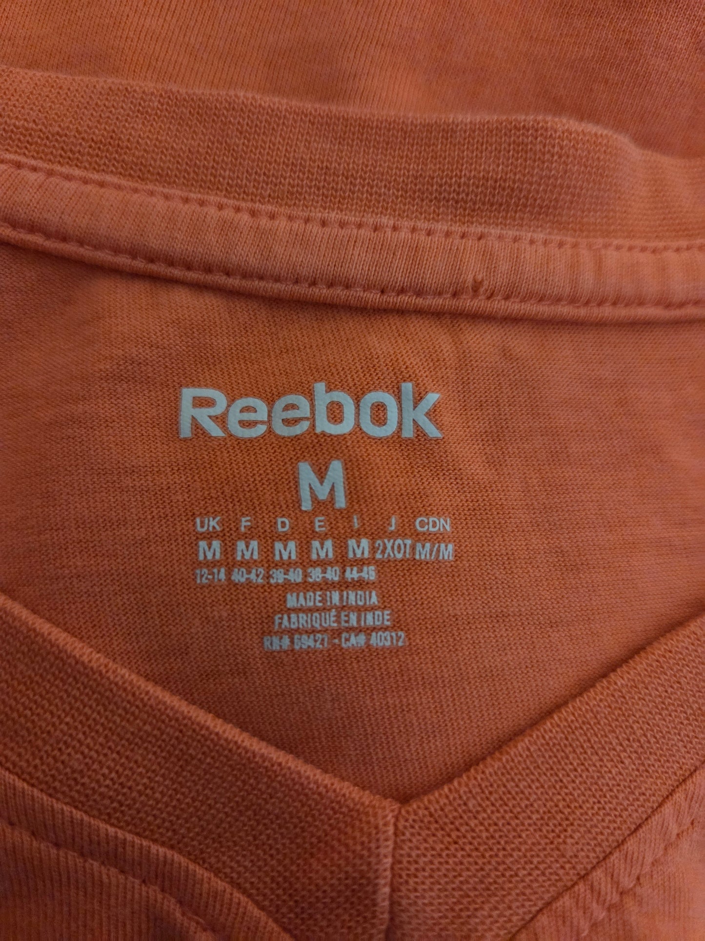 Close-up of a Reebok size label